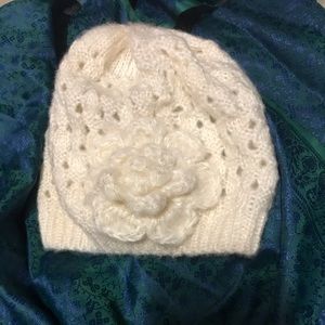 Creamy white knit beanie with stitched flower